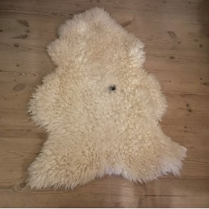 Lammeskind med sort plet