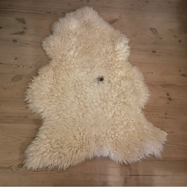 Lammeskind med sort plet