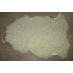 Rhvidt lokket skind med meget svage mrke strejf