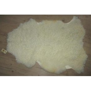 Rhvidt lokket skind med meget svage mrke strejf