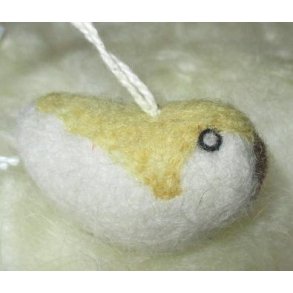 Fugl, gul og rhvid beregnet til at hnge, har ophng